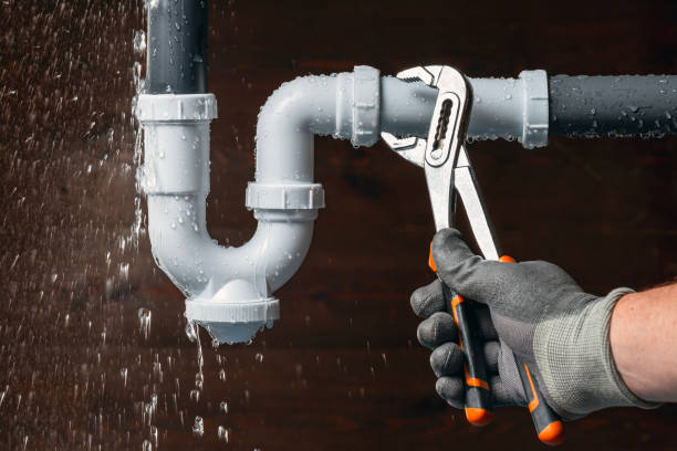 Professional Drain Cleaning technician working in Winter Beach, FL